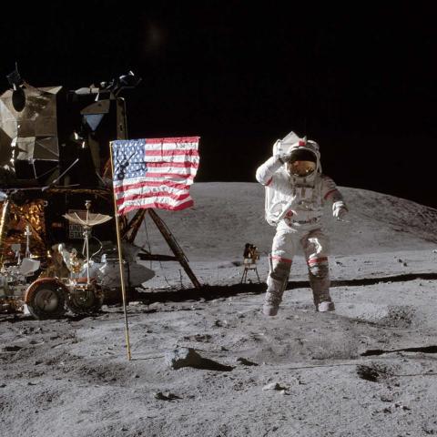 Astronaut John Young leaps from lunar surface to salute flag