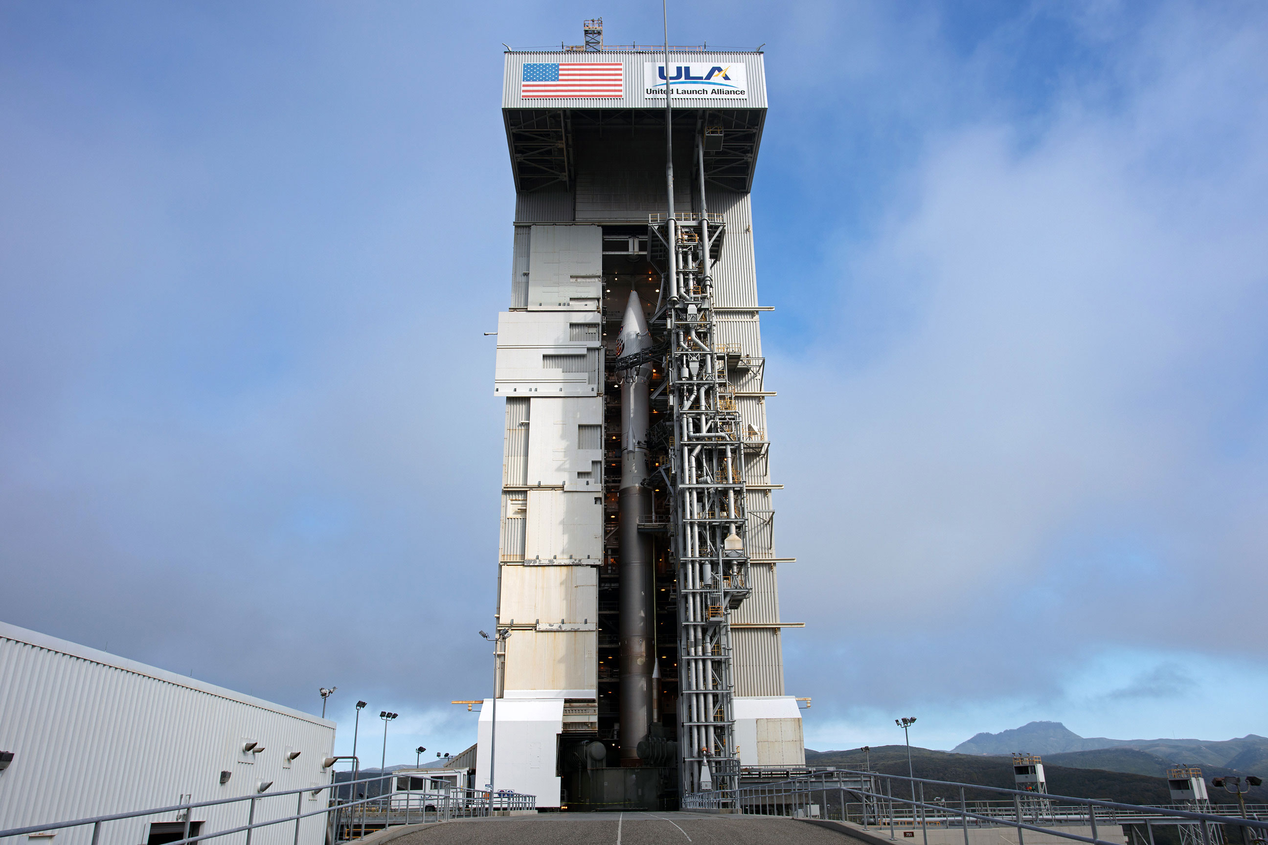 InSight’s Atlas V rocket sits inside of the Mobile Service Tower at Space Launch Complex 3 the day before launch.  Photo: Jon Brack