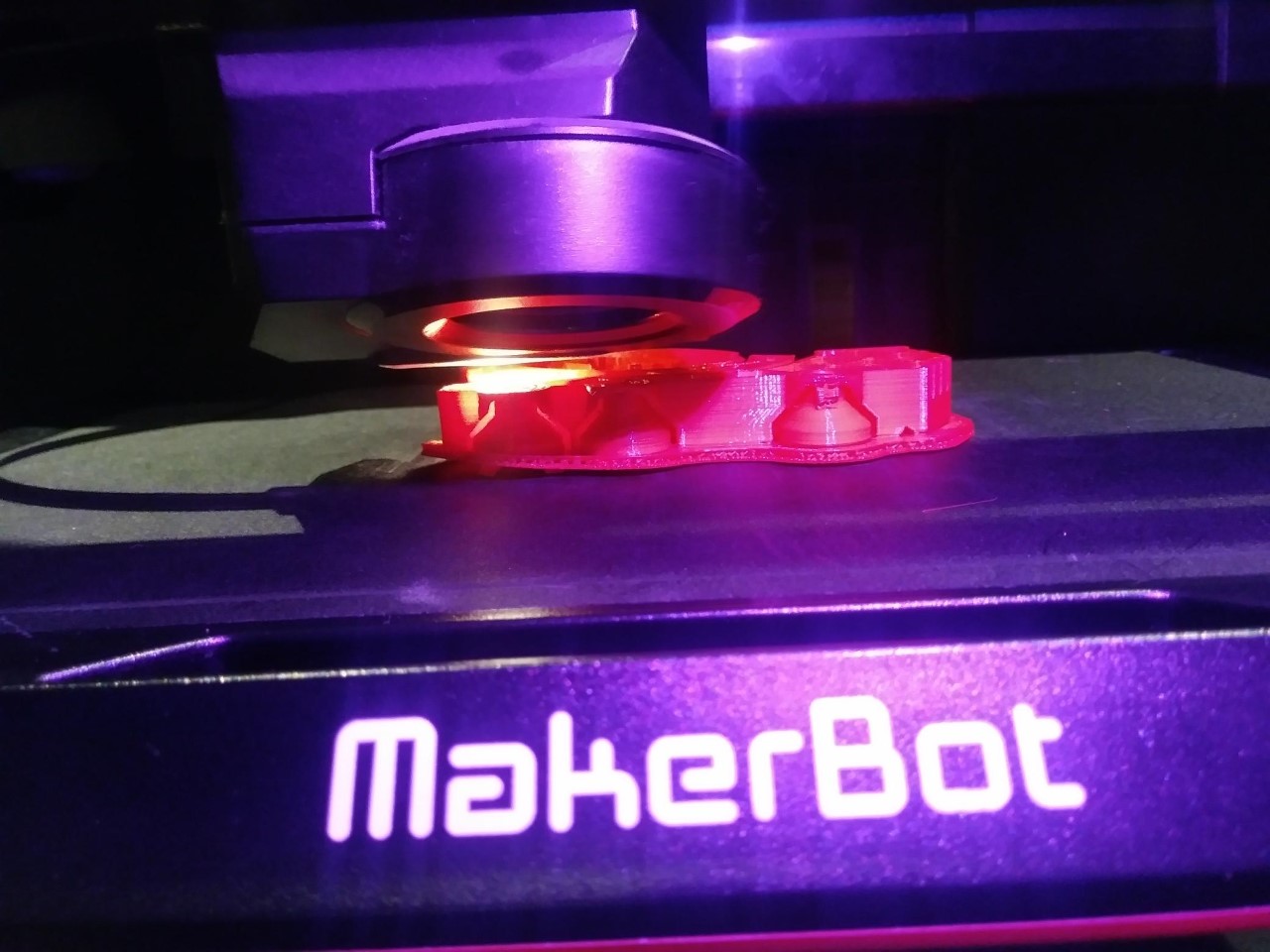 Image of a purple MakerBot 3D printer