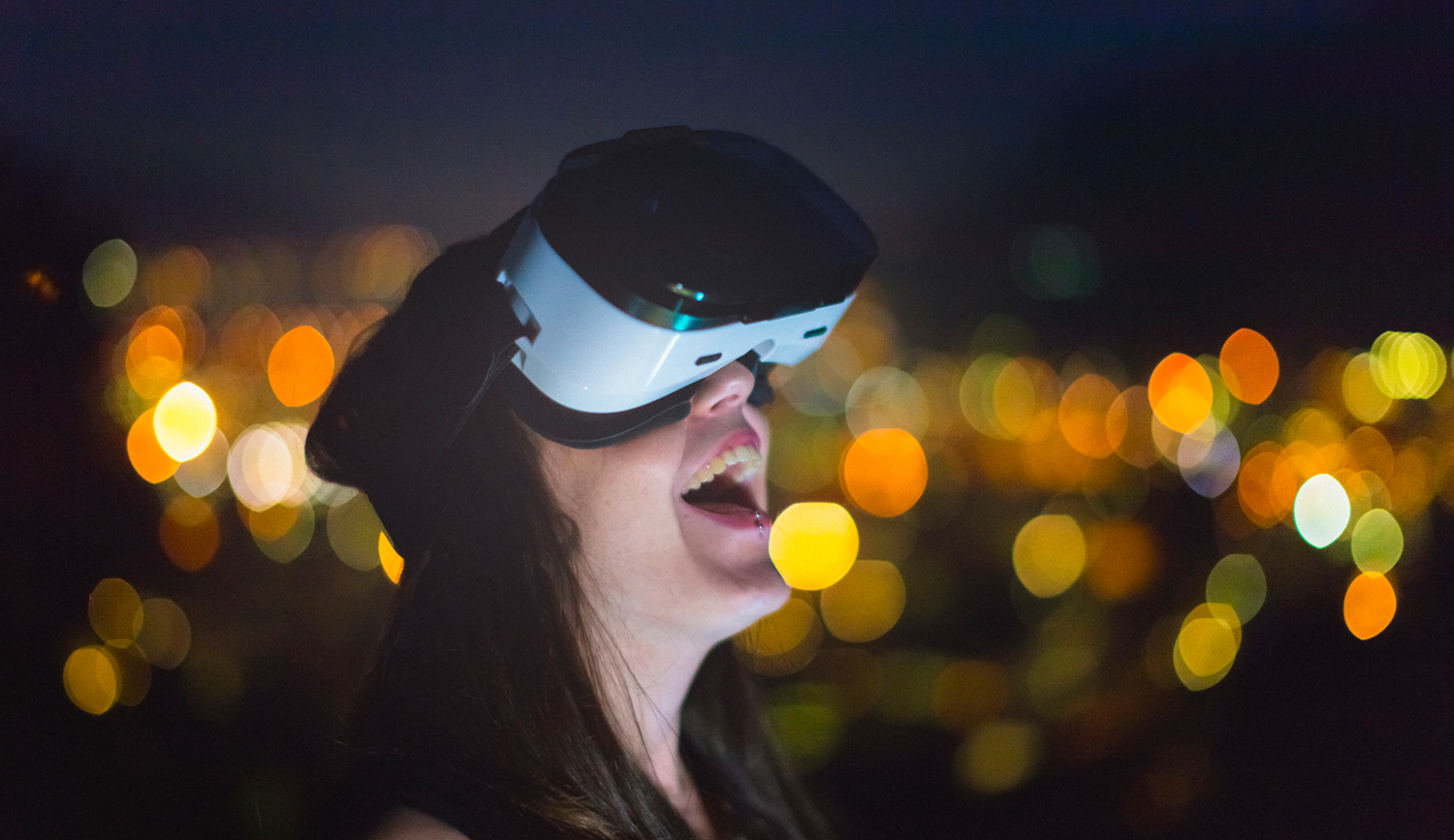 Woman experiencing virtual reality through a headset