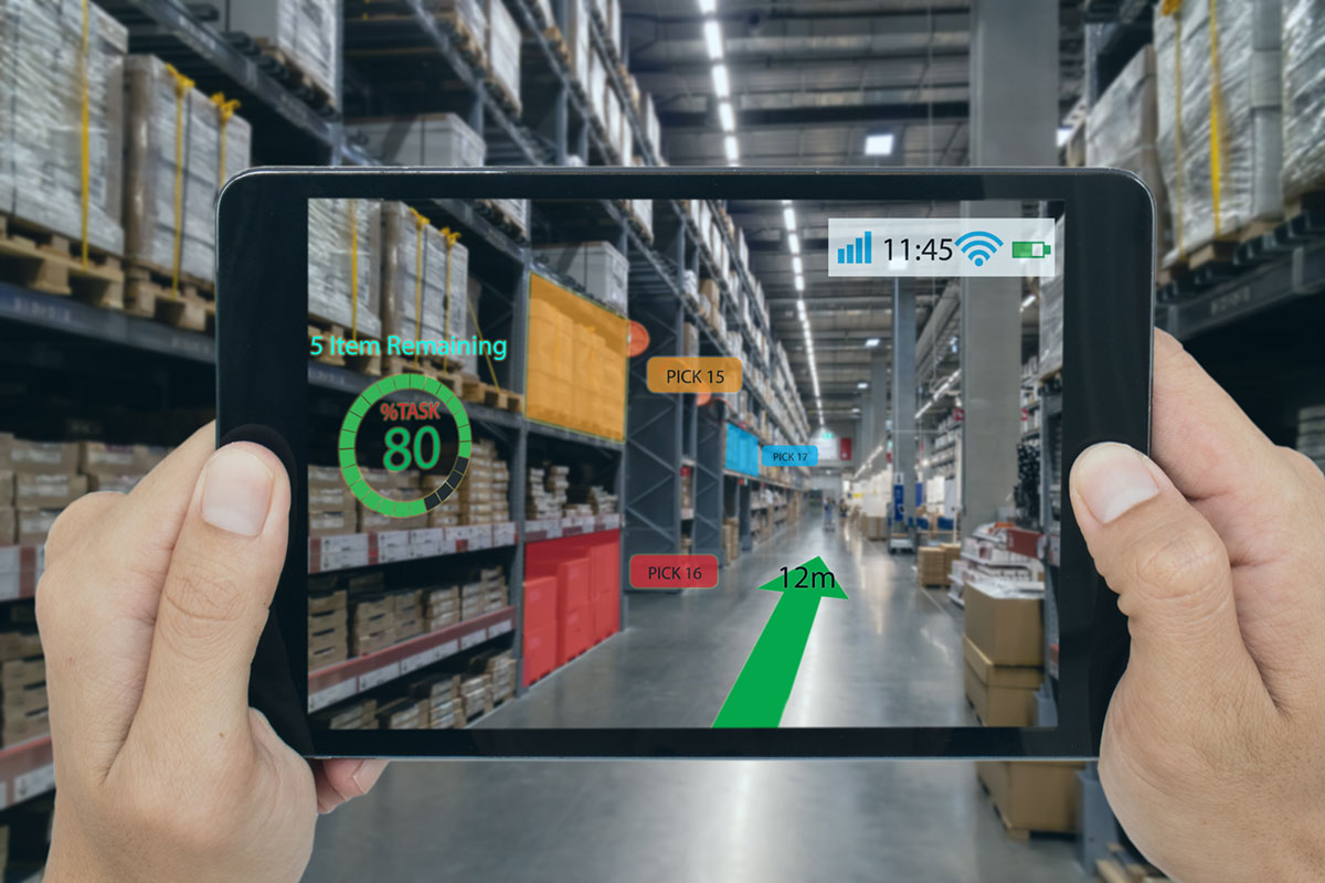 A conceptual illustration shows an iPad scanning a warehouse in the real world and showing, on screen, tasks that need to be done throughout the space.