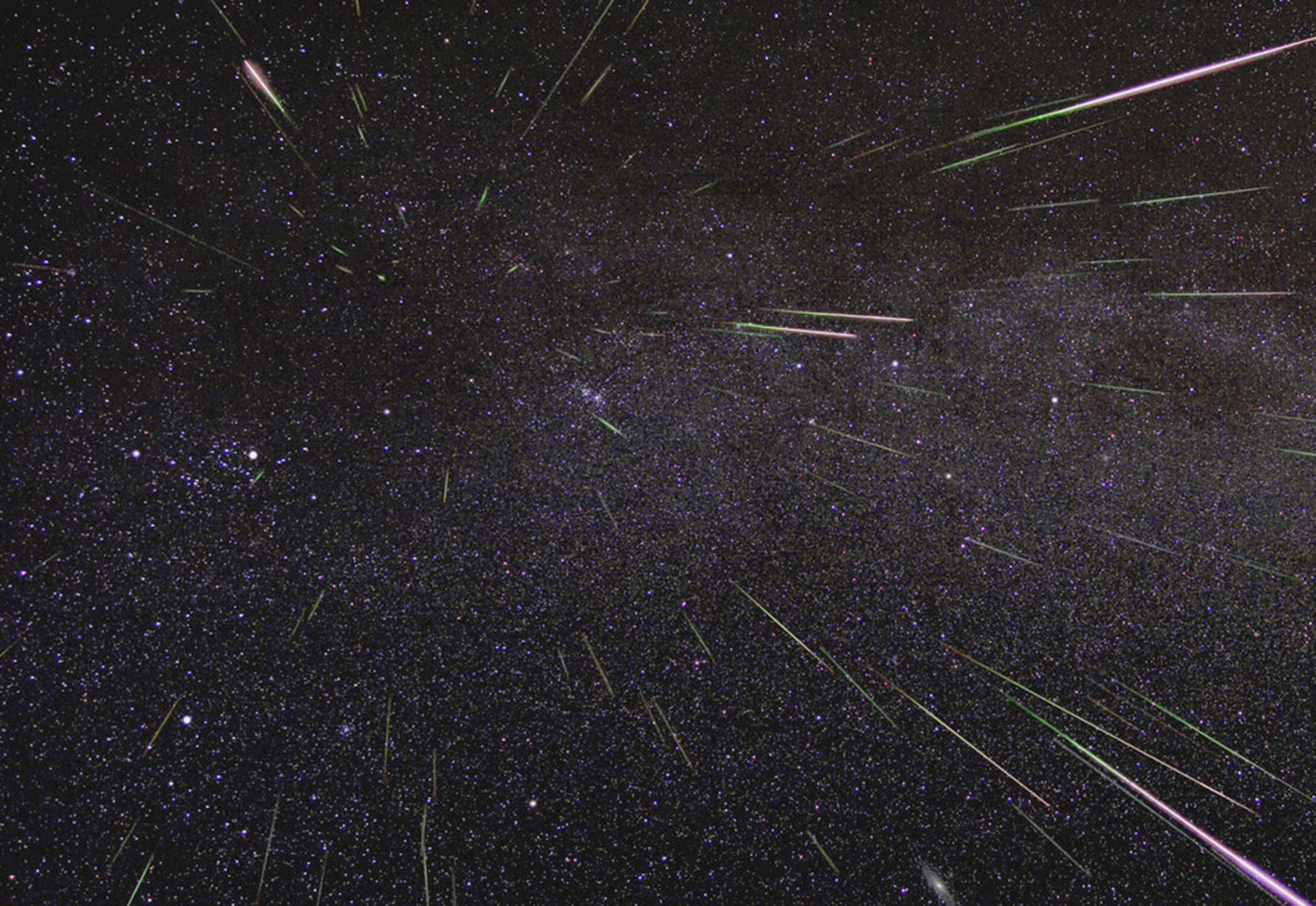 An outburst of Perseid meteors lights up the sky in August 2009 in this time-lapse image. Stargazers expect a similar outburst during next week’s Perseid meteor shower, which will be visible overnight on Aug. 11 and 12.