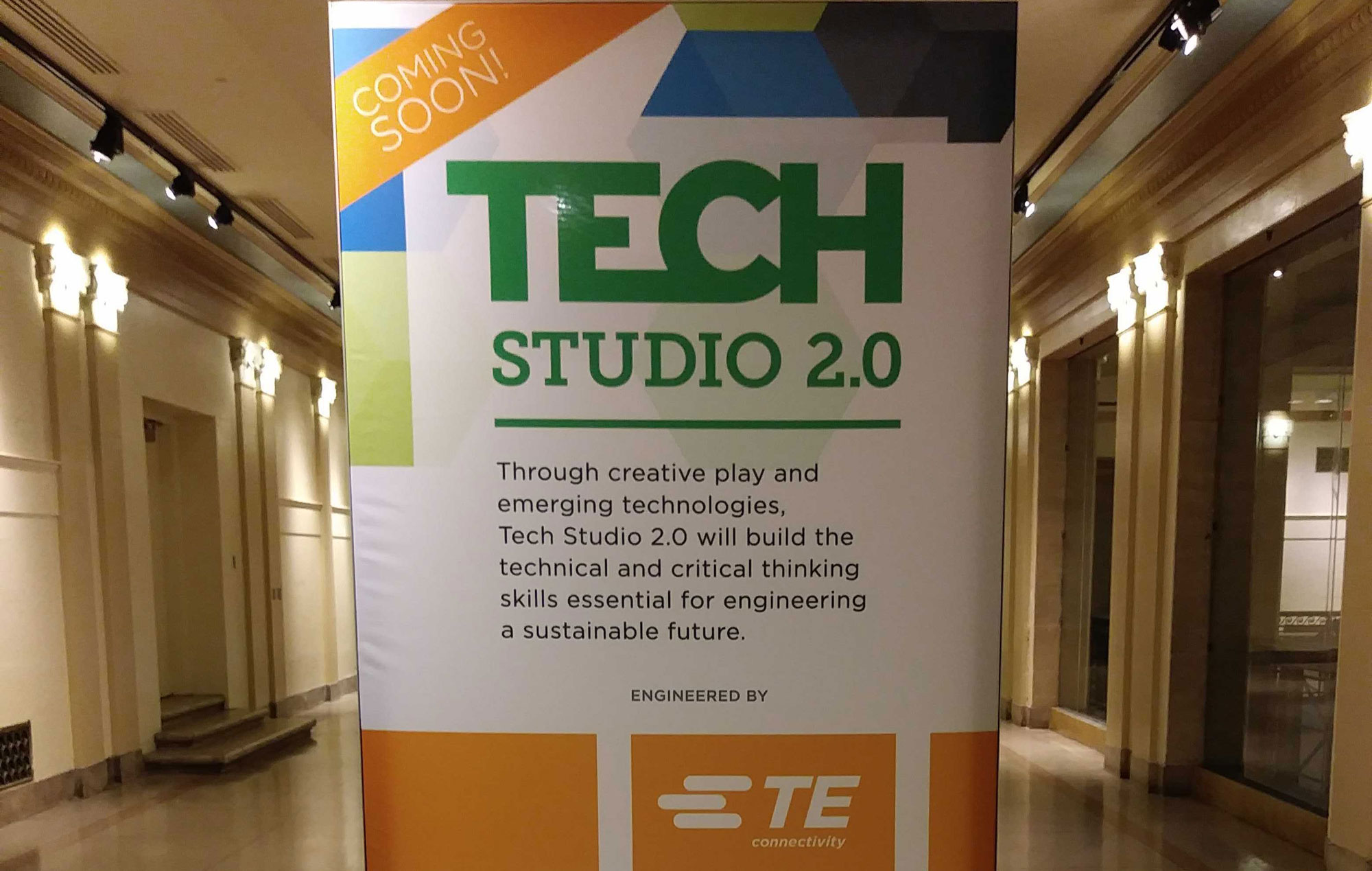 A banner in The Franklin Institute reads, "Tech Studio: Coming Soon. Engineered by TE Connectivity."