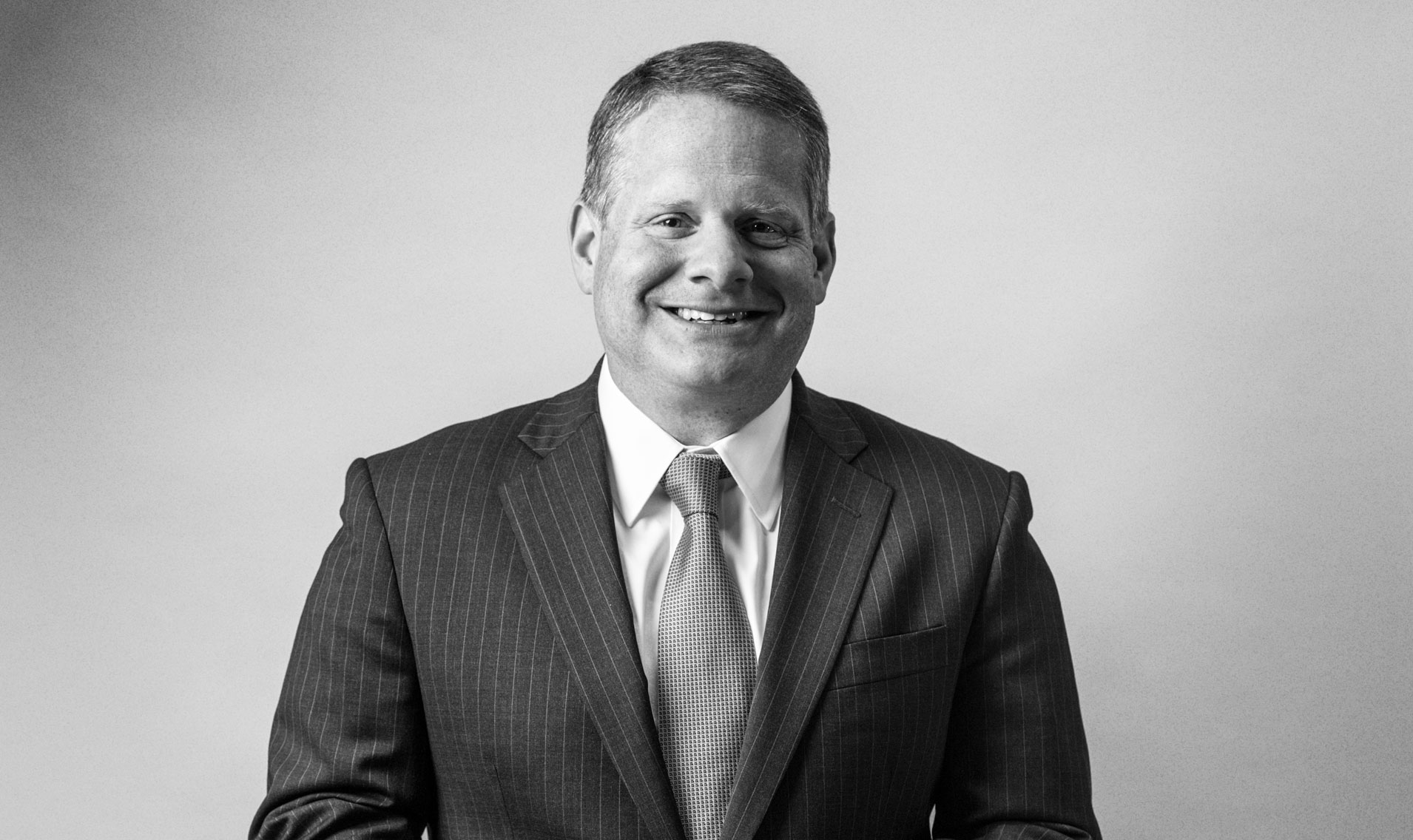 Black and white photograph of Larry Dubinski, President and CEO of The Franklin Institute