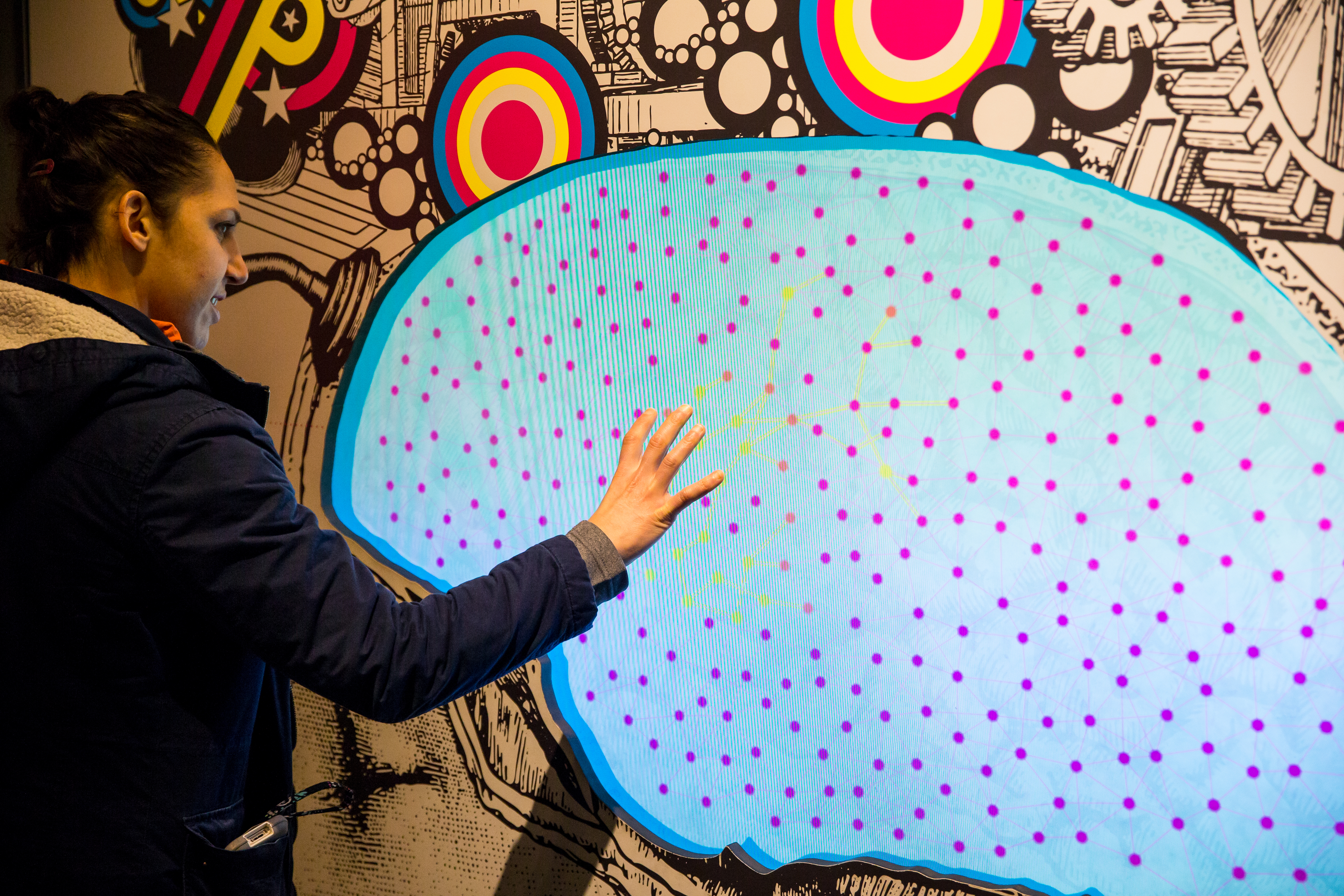 teacher exploring the brain exhibit at The Franklin Institute