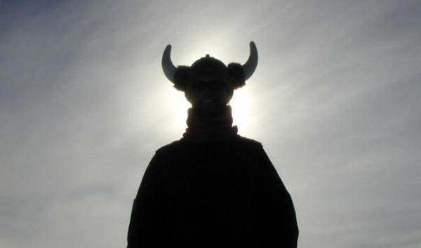 modern photo of individual wearing horned helmet