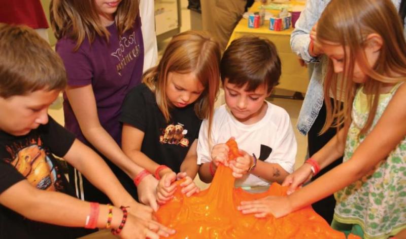 children pulling slime