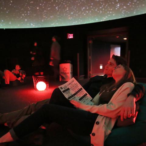 couple in planetarium