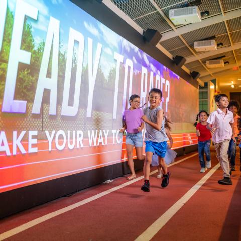 Kids running in SportsZone